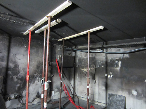 Fire damage in outer room – including ceiling collapse